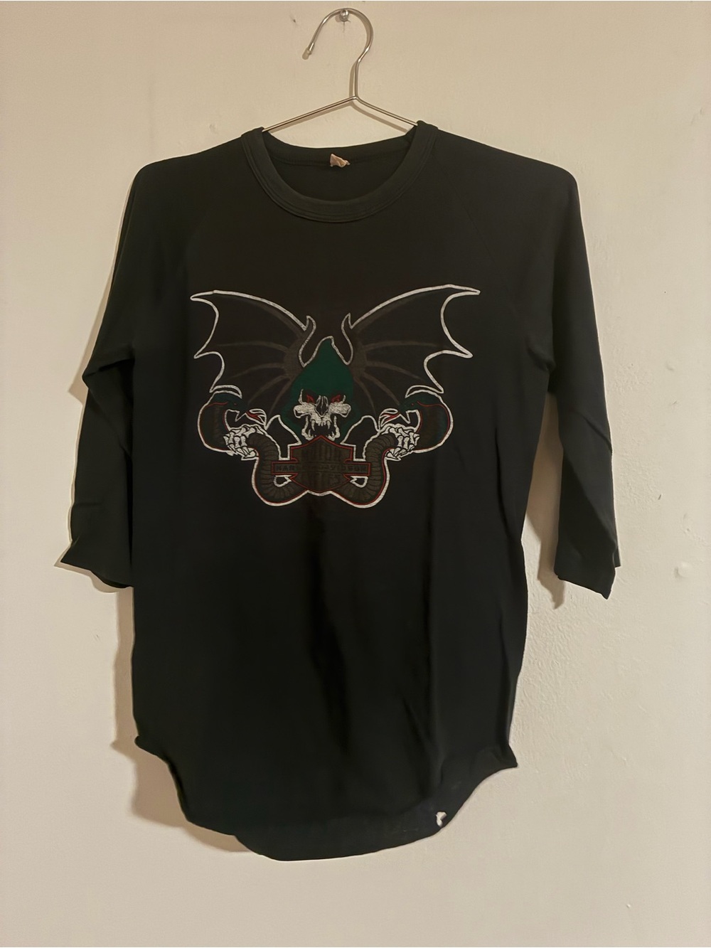 Harley Davidson vintage bootleg T-shirt with cobra and winged reaper graphic.